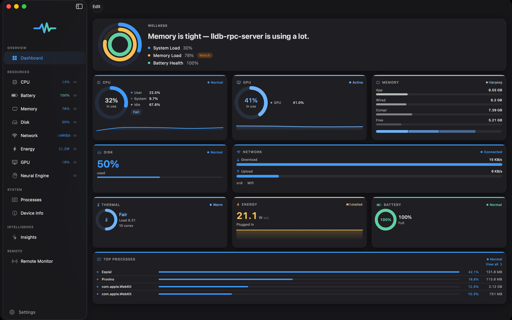 Espial on Mac: the full dashboard with a wellness ring reading “Memory is tight — lldb-rpc-server is using a lot”, plus live CPU, GPU, memory, disk, network, thermal, energy, and battery tiles and a top-processes list